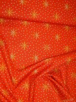 Baumwollpopeline Sternenregen Weihnachtsstoff in Orangerot