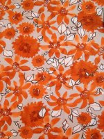 Baumwolljersey Pumpkin Flowers Rostorange Elastikjersey COUPON 120x155cm